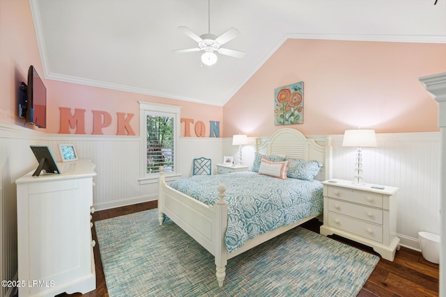 bedroom featuring dark wood-type flooring, ceiling fan, lofted ceiling, and crown molding