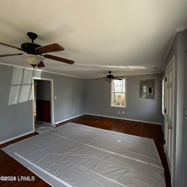 907 Duke St, Beaufort, SC 29902 - unfurnished room featuring ornamental molding, dark wood-type flooring, baseboards, a ceiling fan, and electric panel