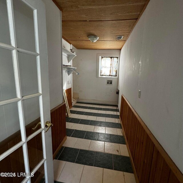 907 Duke St, Beaufort, SC 29902 - hall with visible vents, wooden ceiling, and wood walls