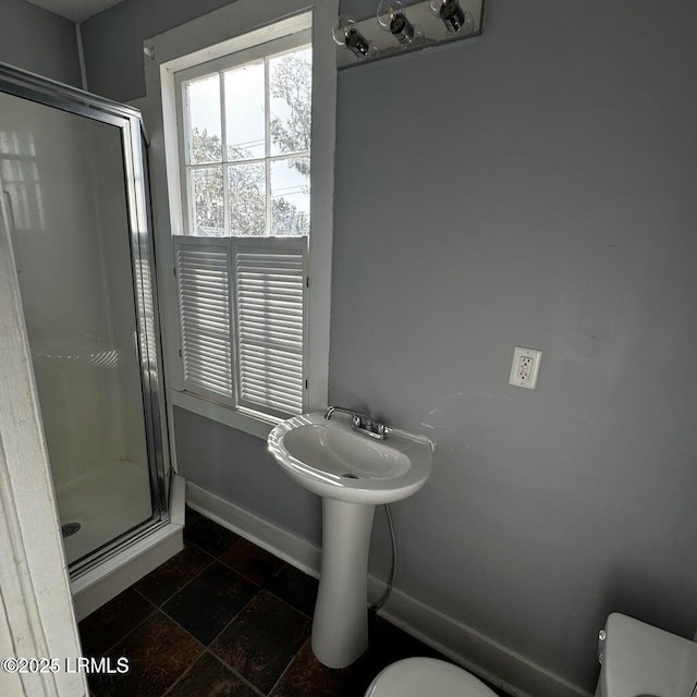 907 Duke St, Beaufort, SC 29902 - full bath featuring toilet, baseboards, and a shower stall