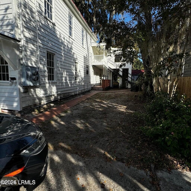 907 Duke St, Beaufort, SC 29902 - view of side of home with fence and stairs