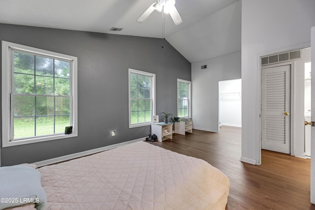 125 Harvest Cir, Bluffton, SC 29910 - bedroom featuring multiple windows, wood finished floors, baseboards, vaulted ceiling, and ceiling fan
