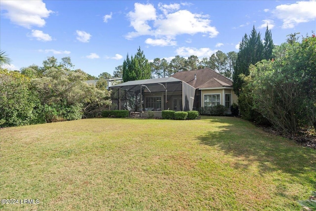 view of yard with a lanai