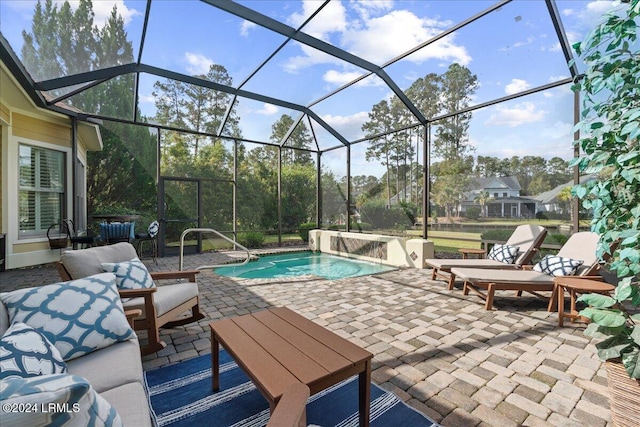 view of swimming pool featuring a lanai and a patio area