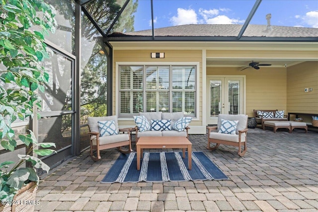 view of patio featuring an outdoor living space, french doors, and ceiling fan