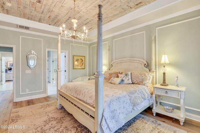 bedroom with ornamental molding, hardwood / wood-style floors, wooden ceiling, and an inviting chandelier