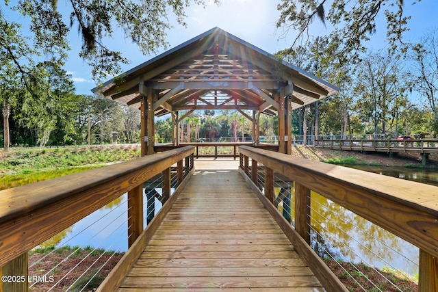 dock area featuring a gazebo and a water view