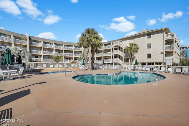 view of pool featuring a patio