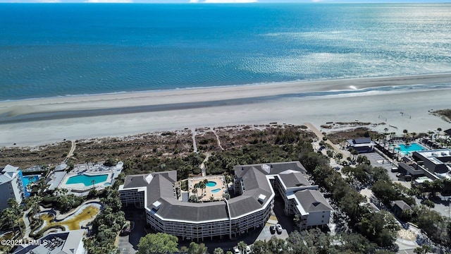 bird's eye view with a water view and a view of the beach