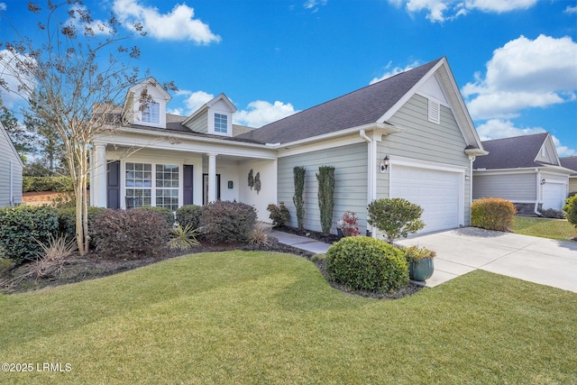 view of front facade with a garage and a front lawn