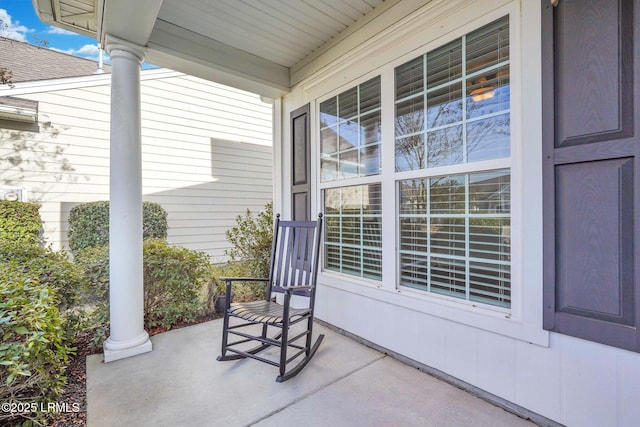 view of patio featuring a porch