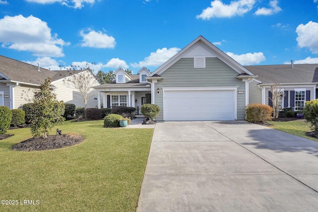 view of front facade featuring a garage and a front lawn