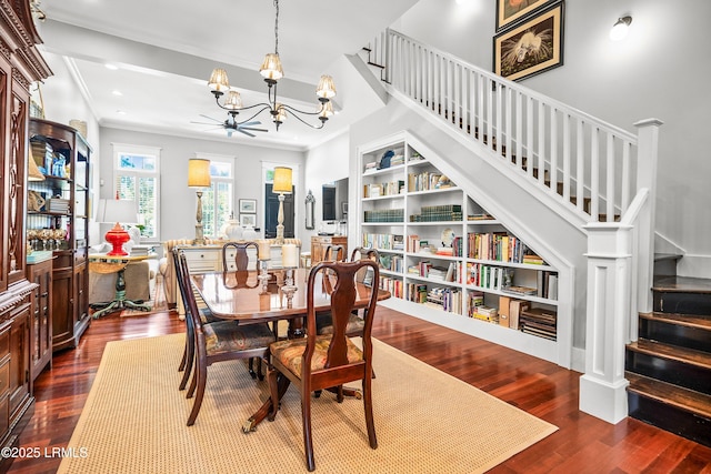 22 Harford Unit B, Beaufort, SC 29906 - dining area featuring a chandelier, stairway, dark wood-style flooring, ornamental molding, and recessed lighting