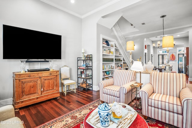 22 Harford Unit B, Beaufort, SC 29906 - living area with dark wood finished floors, built in shelves, crown molding, a chandelier, and recessed lighting