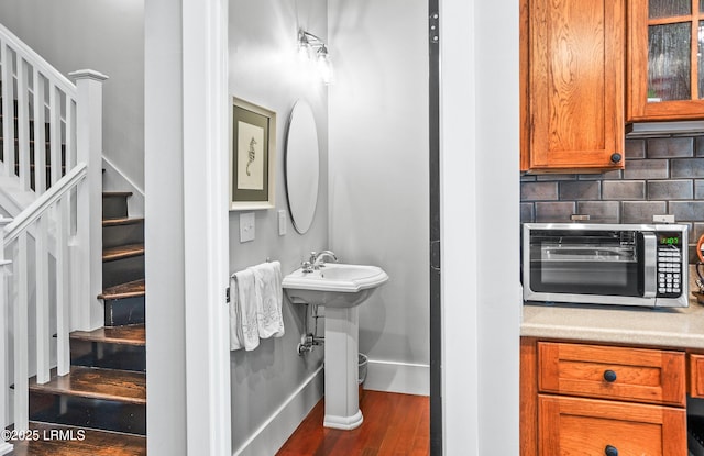 22 Harford Unit B, Beaufort, SC 29906 - half bath with wood finished floors and backsplash