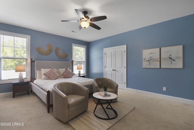 587 Hulston Landing Rd, Bluffton, SC 29909 - bedroom with light colored carpet, a closet, and a ceiling fan