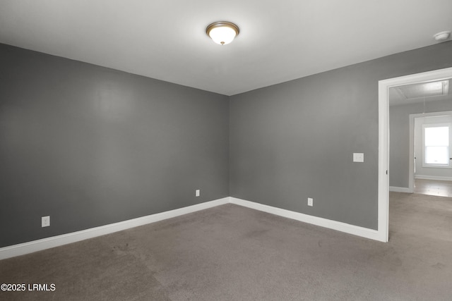 587 Hulston Landing Rd, Bluffton, SC 29909 - spare room featuring attic access and carpet