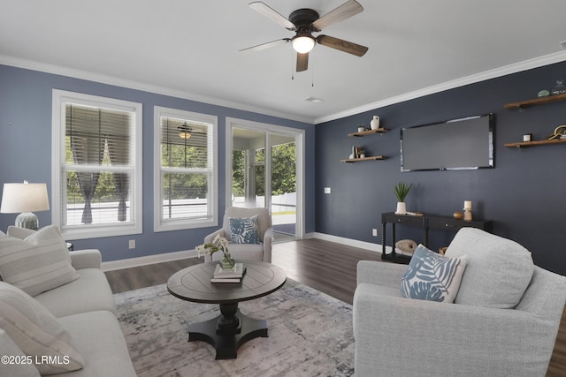 587 Hulston Landing Rd, Bluffton, SC 29909 - living room featuring healthy amount of natural light, ornamental molding, wood finished floors, and a ceiling fan