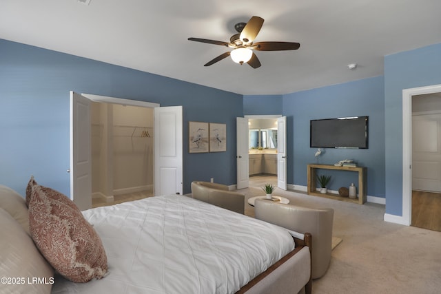 587 Hulston Landing Rd, Bluffton, SC 29909 - bedroom with light colored carpet, a ceiling fan, and ensuite bathroom