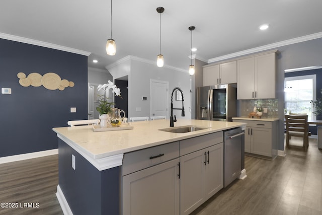 587 Hulston Landing Rd, Bluffton, SC 29909 - kitchen with gray cabinetry, appliances with stainless steel finishes, ornamental molding, tasteful backsplash, and decorative light fixtures