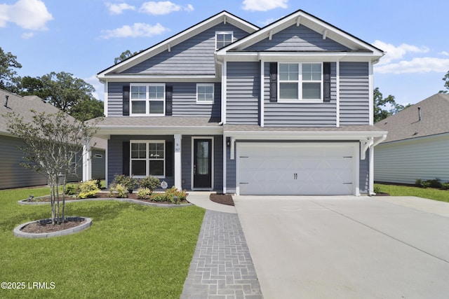 587 Hulston Landing Rd, Bluffton, SC 29909 - view of front of house with concrete driveway, an attached garage, a front lawn, and a porch