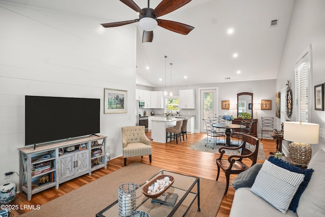 1 William St, Beaufort, SC 29907 - living room with recessed lighting, light wood-style floors, a ceiling fan, and high vaulted ceiling
