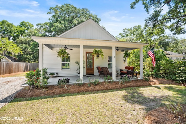 1 William St, Beaufort, SC 29907 - bungalow with fence, outdoor lounge area, a front lawn, and a ceiling fan