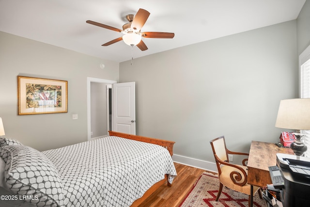 1 William St, Beaufort, SC 29907 - bedroom with ceiling fan, baseboards, and wood finished floors