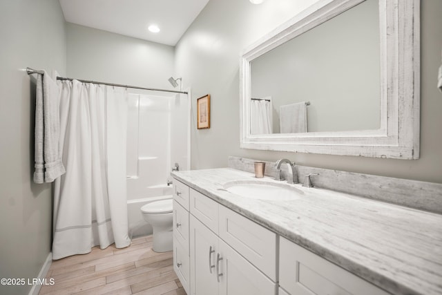 1 William St, Beaufort, SC 29907 - bathroom featuring recessed lighting, toilet, shower / bath combination with curtain, vanity, and wood finished floors