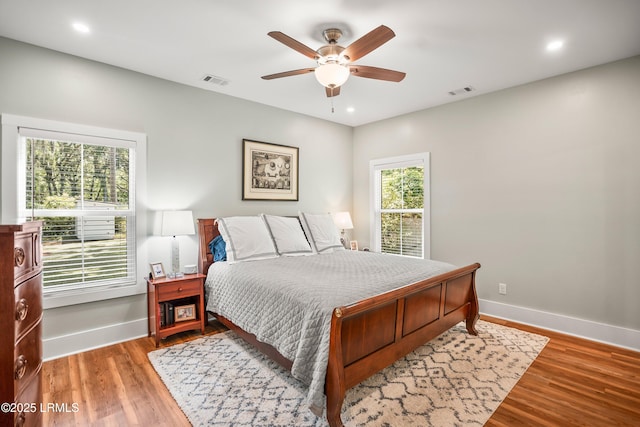 1 William St, Beaufort, SC 29907 - bedroom with recessed lighting, baseboards, visible vents, and wood finished floors