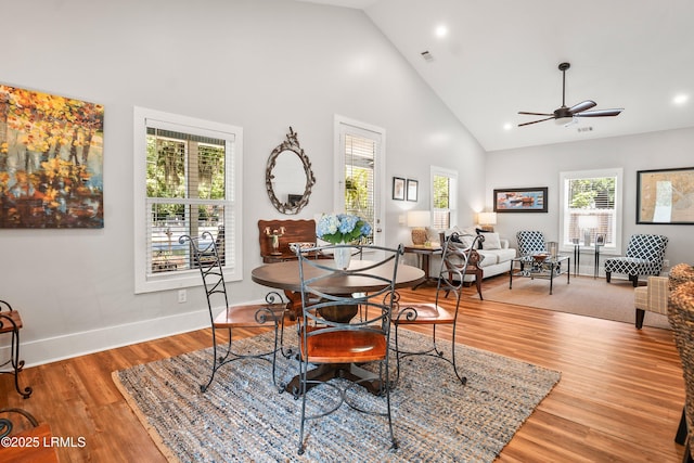 1 William St, Beaufort, SC 29907 - dining space with wood finished floors, high vaulted ceiling, visible vents, a ceiling fan, and baseboards