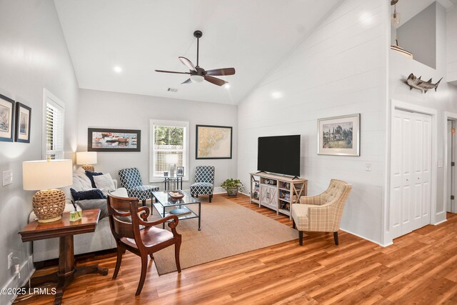 1 William St, Beaufort, SC 29907 - living room featuring a ceiling fan, baseboards, visible vents, high vaulted ceiling, and wood finished floors
