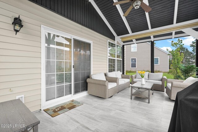 exterior space with an outdoor living space and a ceiling fan