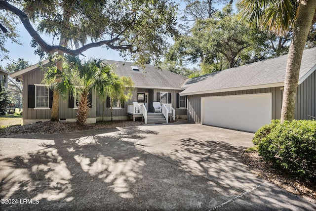 single story home featuring a garage