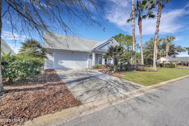 ranch-style home with a garage and a front lawn