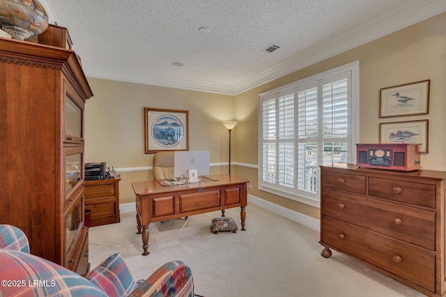 office space featuring ornamental molding, light colored carpet, and a textured ceiling