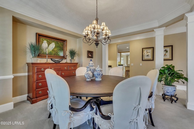 dining area featuring light carpet, a textured ceiling, ornamental molding, and a chandelier