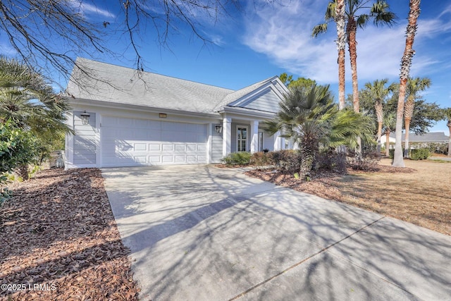 single story home featuring a garage