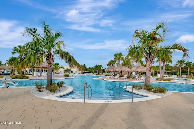 view of swimming pool featuring a patio area