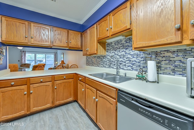 kitchen with sink, dishwashing machine, decorative backsplash, kitchen peninsula, and crown molding