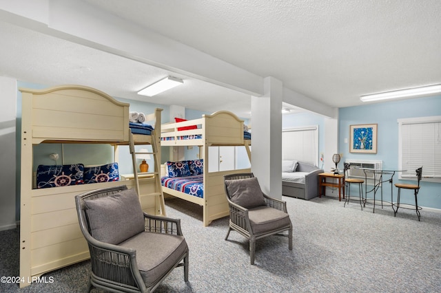 carpeted bedroom with a textured ceiling