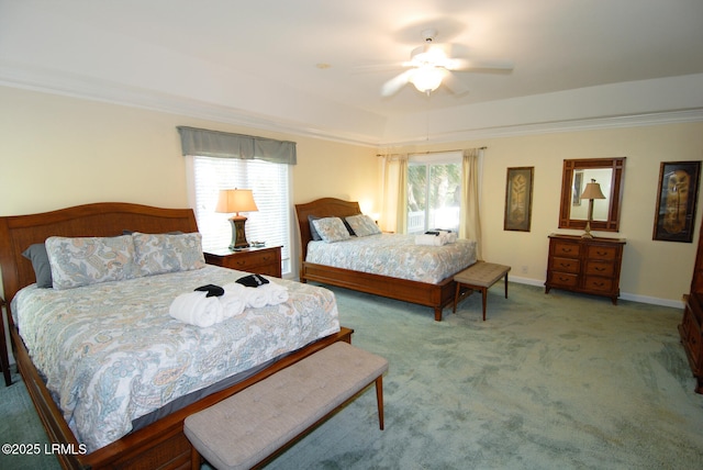 101 Ocean Point Dr, Fripp Island, SC 29920 - carpeted bedroom with ornamental molding, baseboards, and a ceiling fan