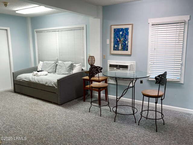101 Ocean Point Dr, Fripp Island, SC 29920 - bedroom with carpet flooring, baseboards, and a textured ceiling