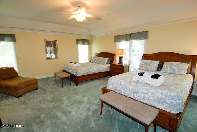 101 Ocean Point Dr, Fripp Island, SC 29920 - carpeted bedroom featuring baseboards, crown molding, and a ceiling fan