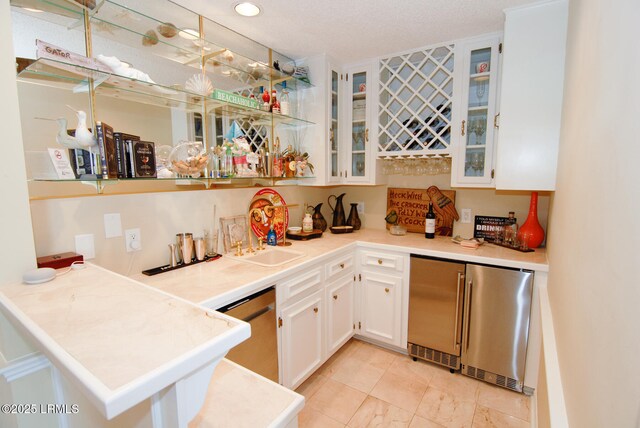 101 Ocean Point Dr, Fripp Island, SC 29920 - indoor wet bar featuring refrigerator, dishwasher, and recessed lighting