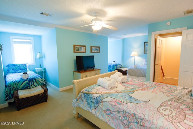 101 Ocean Point Dr, Fripp Island, SC 29920 - carpeted bedroom with baseboards and a ceiling fan