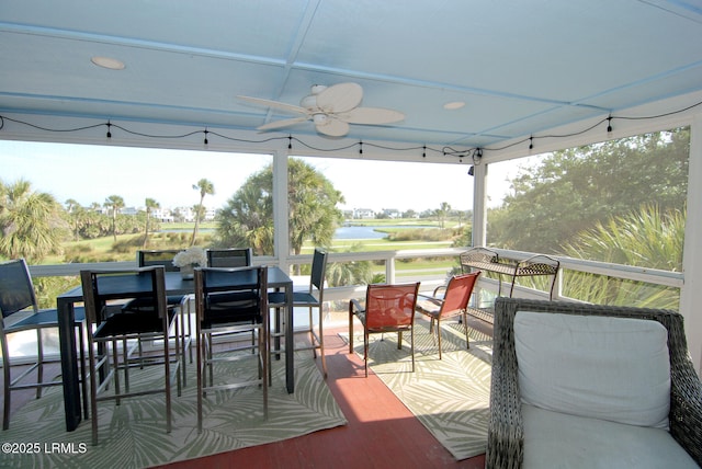 101 Ocean Point Dr, Fripp Island, SC 29920 - deck with a water view, ceiling fan, and outdoor dining space