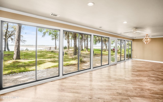 83 Sunset Blvd, Beaufort, SC 29907 - interior space with visible vents, plenty of natural light, crown molding, and a water view