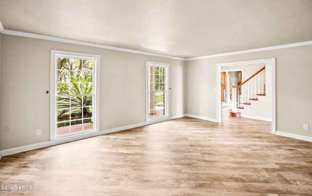 83 Sunset Blvd, Beaufort, SC 29907 - empty room featuring light wood-style flooring, stairs, and crown molding