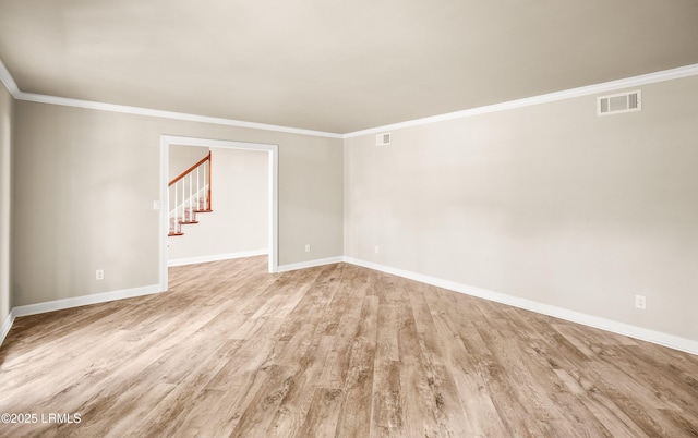 83 Sunset Blvd, Beaufort, SC 29907 - spare room with crown molding, visible vents, light wood-style floors, and baseboards